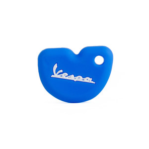Vespa Parts White Silicone Key Case on Blue Background