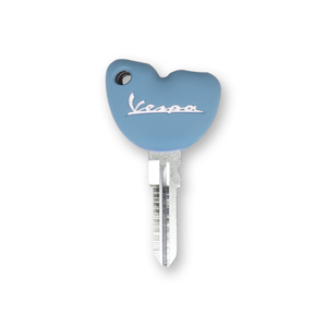 White Silicone Motorcycle Key Case on Light Blue Background