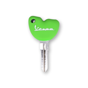White Silicone Key Case on Green Background